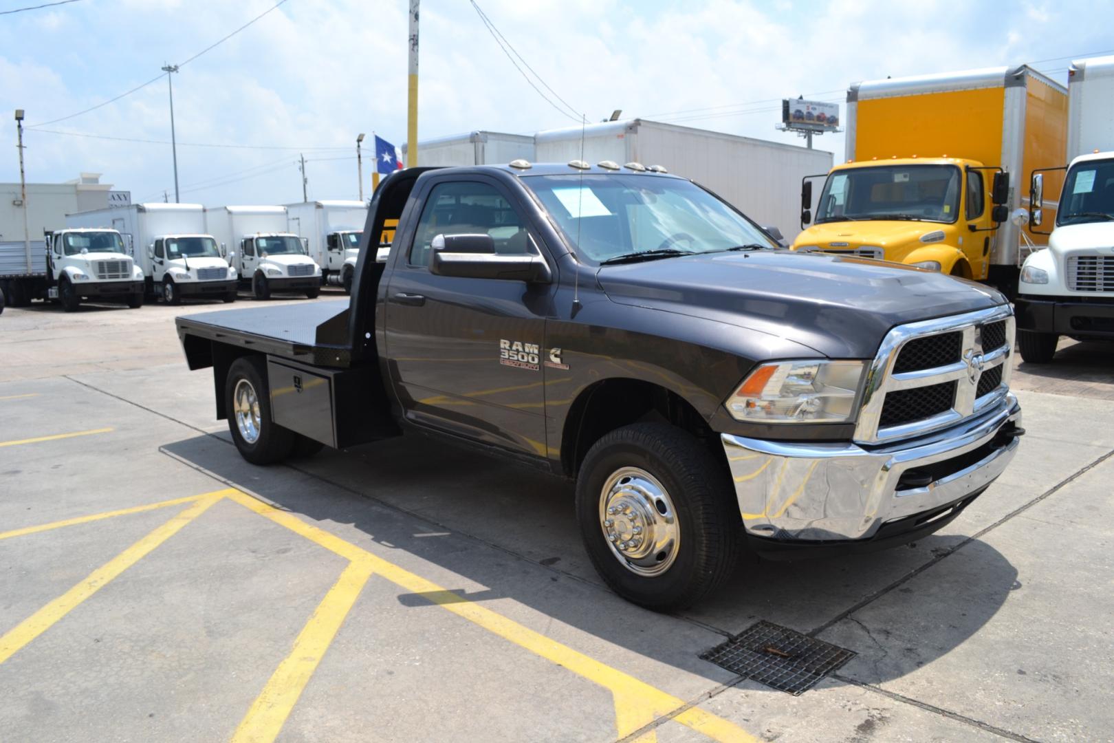 2018 GRAY /BLACK RAM 3500 with an CUMMINS 6.7L TURBO DIESEL engine, AISIN A465 6SPD AUTOMATIC transmission, located at 9172 North Fwy, Houston, TX, 77037, (713) 910-6868, 29.887470, -95.411903 - Photo#2